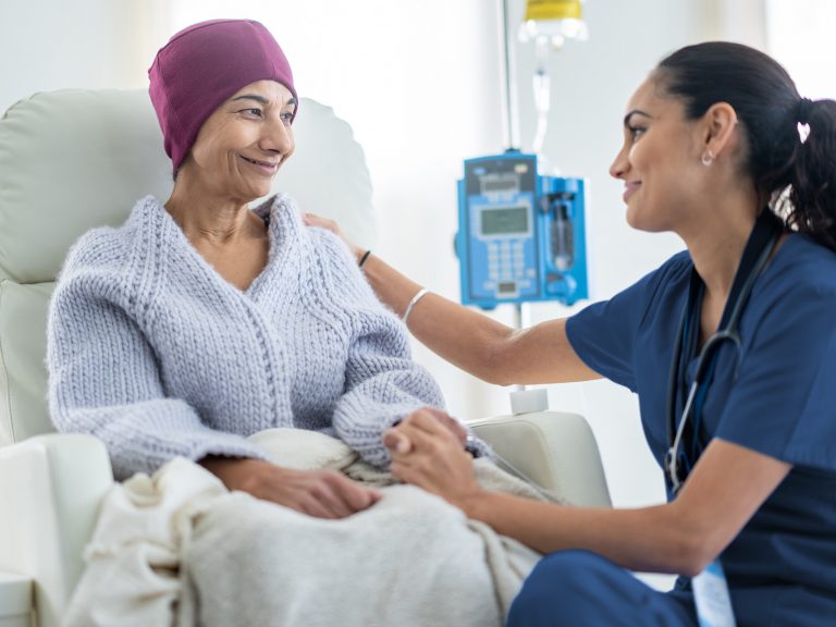 Nurse Talking with an Oncology Patient