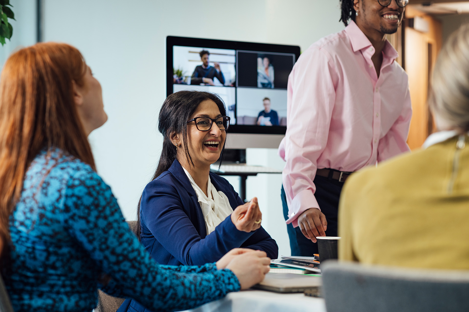 Team meeting with remote colleagues