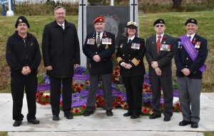 Sandra Jalonen, Director of Operations for Bayshore Medical Personnel, (3rd from left) last Remembrance Day in uniform with her father and extended family.